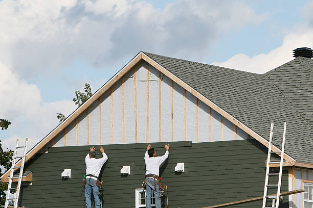 Professional Siding Contractor technician working in Warren, IN